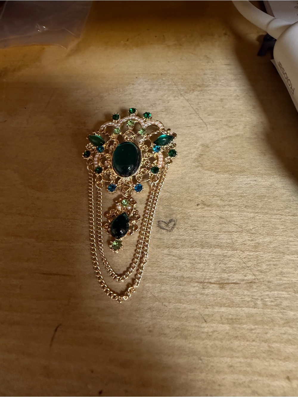 Gold-Tone Brooch with Deep Green Gem Accents